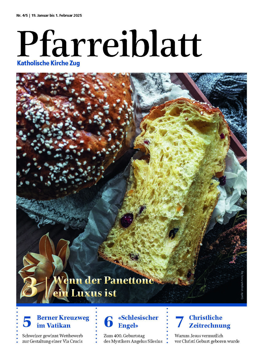 Titelseite des Pfarreiblattes mit Ausgabeangabe, Titelthemen und einem Bild.