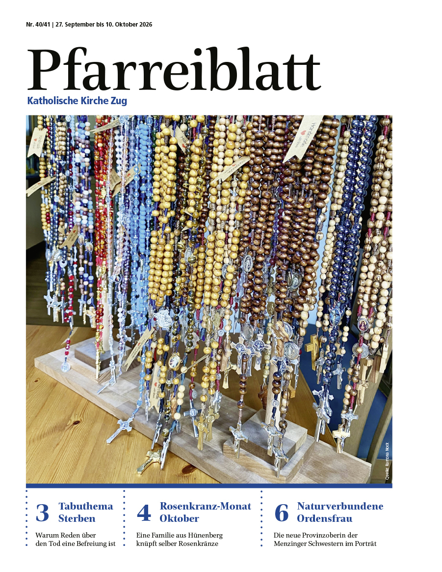 Titelseite des Pfarreiblattes mit Ausgabeangabe, Titelthemen und einem Bild.